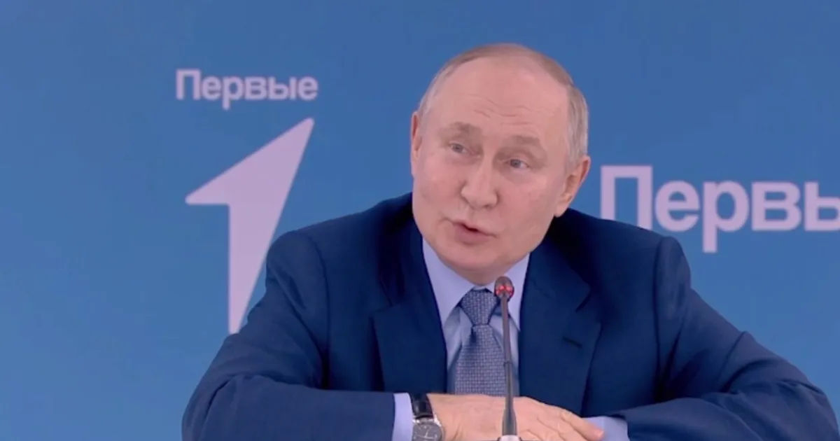 Путин
